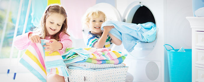 kids playing with soft laundry