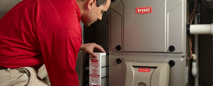 sr-filter Technician replacing furnace filters for home owners
